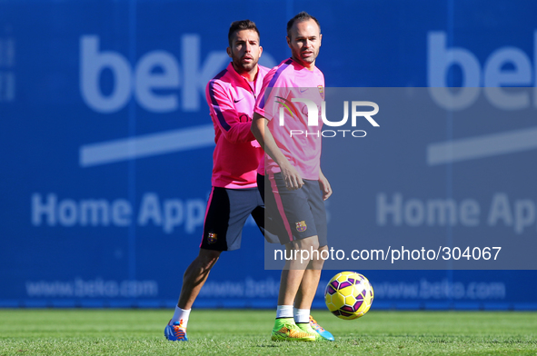 24 October-BARCELONA SPAIN: Andres Iniesta and Jordi Alba in training held at the Joan Gamper Sports City before the match against Real Madr...