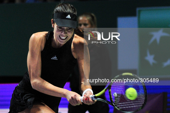 (141024) -- SINGAPORE, Oct. 24, 2014 () -- Serbia's Ana Ivanovic returns the ball during the round robin match against Romania's Simona Hale...