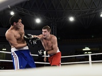 Anton Pinchuk (R) beats Yamil Peralta during Aiba matches in Rome, on October 24, 2014. (