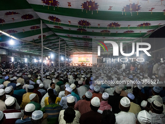 A group of imams were delivering their speech while thousands of peoples were listening to them. (