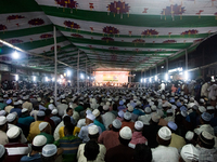 A group of imams were delivering their speech while thousands of peoples were listening to them. (
