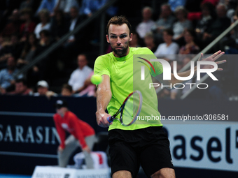 Ivo Karlovic (CRO) returns the ball with a backhand during the semi final of the Swiss Indoors at St. Jakobshalle in Basel, Switzerland on O...