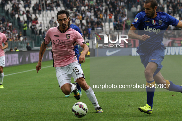 Palermo midfielder Francesco Bolzoni (15) fight for the ball against Juventus defender Giorgio Chiellini (3) during the Serie A football mat...