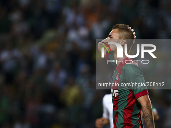 Maritimo's defender Patrick Bauer reacts after scoring  an own goal during the Portuguese League football match between Sporting CP and CS M...