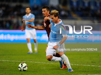 Biglia and Vives during the Serie A match between SS Lazio and Torino at Olympic Stadium, Italy on October 26, 2014. (