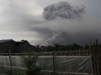 Sinabung volcano with lava blob blowing a giant black cloud of volcanic ash after the eruption of the latest in Simpang Empat, Karo, Sumatra...