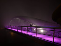 A foggy night view of the Father Bernatka Footbridge on 29th October 2014 in Krakow.
Krakow's Father Bernatka Footbridge is a footbridge fo...