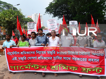 Activists from Bangladeshi garments organization stage demonstration in Dhaka rejecting the government’s decision to raise their minimum mon...