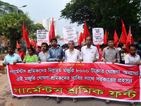Activists from Bangladeshi garments organization stage demonstration in Dhaka rejecting the government’s decision to raise their minimum mon...