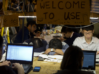 28th of October, 2015. Hong Kong, Hong Kong island, Admiralty. Pro-democracy protesters rests and do their homework at a study area along th...