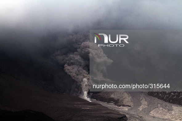 Hot clouds of progress as pyroclastic avalanches from the volcano Sinabung in Karo, Sumatra Island, Indonesia on October 30, 2014. Mount Sin...