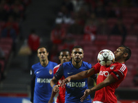 Benfica's forward Eduardo Salvio (R) vies for the ball with Monaco's defender Layvin Kurzawa (2nd R)  during the UEFA Champions League group...