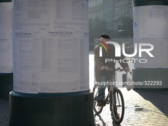 City of Krakow prepares for the local elections to be held on 16 November 2014. View of the local person reading the election advertising st...