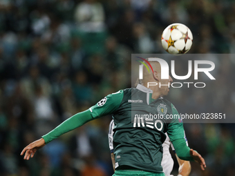Sporting's forward Islam Slimani heads for the ball during the UEFA Champions League  group G football match between Sporting CP and FC Scha...