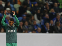 Sporting's midfielder Nani (R) celebrates his goal  during the UEFA Champions League  group G football match between Sporting CP and FC Scha...