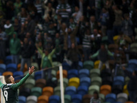 Sporting's forward Islam Slimani celebrates after scoring a goal during the UEFA Champions League group G football match between Sporting CP...