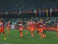 FC Pune City footballers celebrates 
ISL match at Salt Lake Stadium on November 7, 2014 in Kolkata, India. FC Pune City triumphed 3-1 to ha...