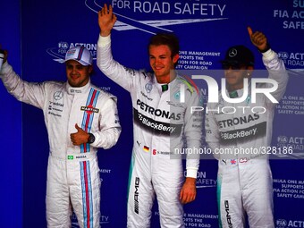 Williams' Felipe Massa (l) qualified in 3rd position; Mercedes' Nico Rosberg (c) and Lewis Hamilton (r), 1st and 2nd, respectively, at the 2...