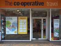 A sign for a UK Co-Operative Travel agent. (