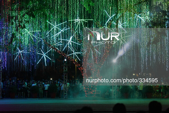 Makati City, Philippines - Spectators watch the Festival of Lights in Makati City, south of Manila on November 12, 2014. The Festival of Lig...