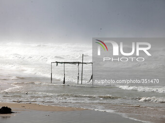 Large waves from rough seas hit the break wall at the Gaza seaport during a windy day in Gaza City on November 24, 2014. UN peace envoy Robe...
