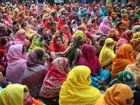 Bangladeshi garment workers block a road during a demonstration to demand higher wages, in Dhaka on January 9, 2019.  (