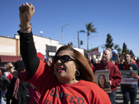 Striking teachers with the Los Angeles Unified School District and supporters of public education march in a parade honoring Dr. Martin Luth...
