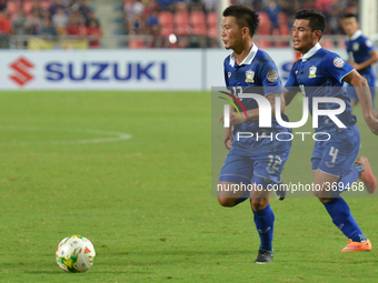 Prakit Deeporm (N.12) of Thailand in actions during the AFF Suzuki Cup 2014 semi-finals 2nd match between Thailand and Philippines at Rajama...
