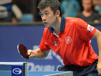 Tang Peng of Hong Kong in action during Men's single of the 2014 ITTF World Tour Grand Finals at Huamark Indoor Stadium on December 12, 2014...
