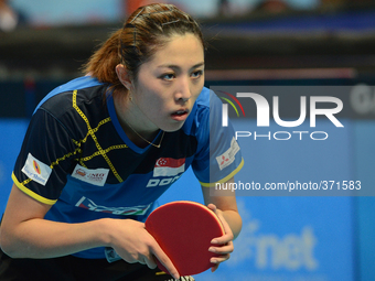 Yu Mengyu of Singapore in actions during Women's single of the 2014 ITTF World Tour Grand Finals at Huamark Indoor Stadium on December 12, 2...