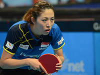 Yu Mengyu of Singapore in actions during Women's single of the 2014 ITTF World Tour Grand Finals at Huamark Indoor Stadium on December 12, 2...