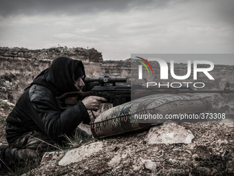 Sniper from rebels, in Aleppo, Syria, on December 13, 2014.  (