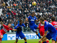 Juventus defender Patrice Evra (33) scores his goal during the Serie A football match n.15 JUVENTUS - SAMPDORIA on 14/12/14 at the Juventus...