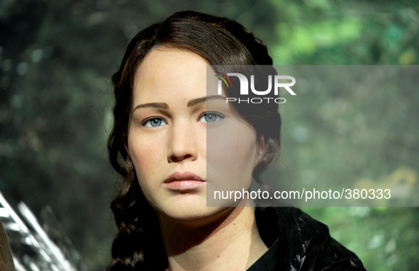 'The Hunger Games' Katniss Everdeen played by Jennifer Lawrence wax figure is unveiled at Madame Tussauds New York on December 18, 2014 in N...