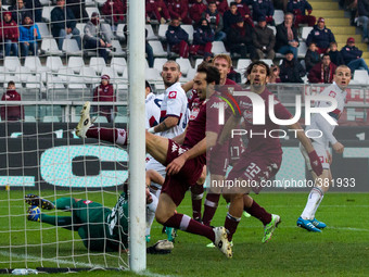 Genoa goalkeeper Eugenio Lamanna (23) dives for the ball during the Serie A football match n.16 TORINO - GENOA on 21/12/14 at the Stadio Oli...