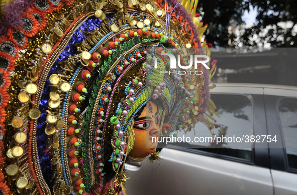 A Chhau dancer wearing a Chhau mask  during a NABC 2015 curtain raiser in Kolkata, Indiaon 28th December 2014.
NABC or North American Benga...