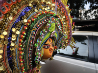 A Chhau dancer wearing a Chhau mask  during a NABC 2015 curtain raiser in Kolkata, Indiaon 28th December 2014.
NABC or North American Benga...
