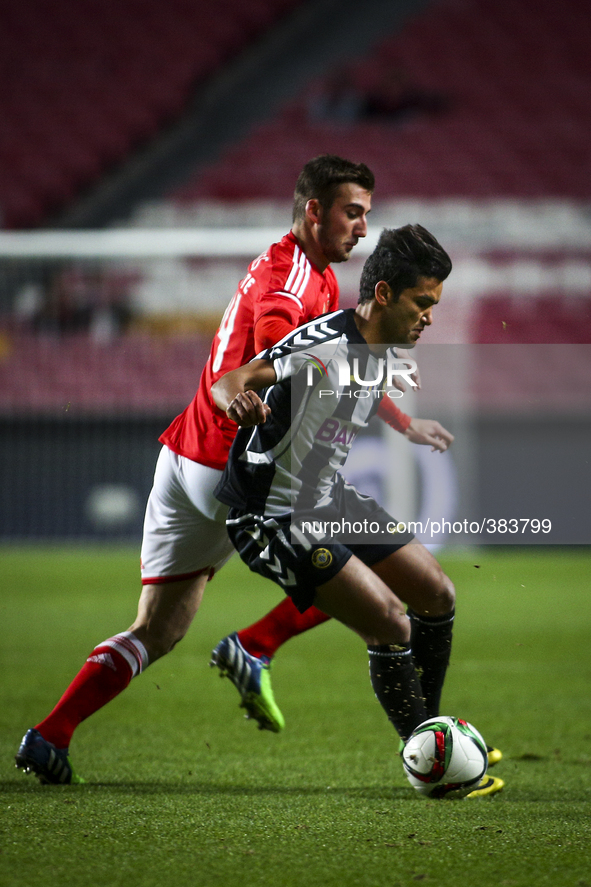 Nacional's midfielder Saleh Gomaa (R) vies with Benfica's midfielder Bryan Cristante during the Portuguese League Cup  football match betwee...