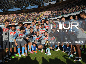 SSC napoli team poses with the Supercoppa during training and presentation on Supercup Supercoppa won in Doha at San Paolo Stadium on August...