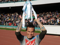 SSC napoli Marek Hamsik poses with the Supercoppa during training and presentation on Supercup Supercoppa won in Doha at San Paolo Stadium o...