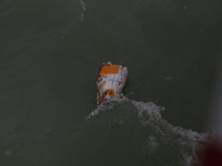 An object suspect as part of the Air Asia Air Plane, but after closing looking its a waste from a boat. At Kalimantan Sea. Jan 2nd 2015 (