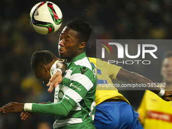 Sporting's forward Carlos Mane (front) vies with Estoril's defender Mano during the Portuguese League  football match between Sporting CP an...