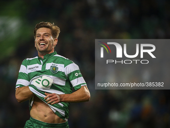 Sporting's midfielder Adrien Silva celebrates after scoring  during the Portuguese League  football match between Sporting CP and Estoril Pr...