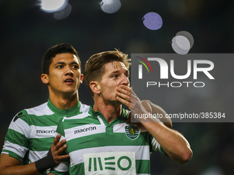 Sporting's midfielder Adrien Silva (R) celebrates with Sporting's forward Fredy Montero after scoring  during the Portuguese League  footbal...