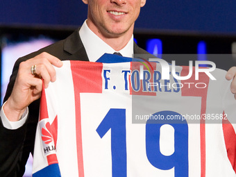Atletico Madrid's new signing Spanish forward Fernando Torres during his official presentation at the Vicente Calderon stadium in Madrid on...