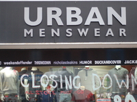 The logo of the Urban Menswear store. (