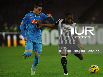 Jose Callejon of SSC Napoli competes for the ball with Patrice Evra Juventus during the italian Serie A football match between SSC Napoli an...
