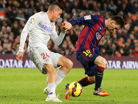 BARCELONA - january 11- SPAIN: Leo Messi and Gimenez in the match between FC Barcelona and Atletico Madrid, for the week 18 of the spanish L...