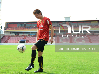 Naoaki Aoyama of Muangthong United poses for a picture after signing for the club at SCG Stadium in Nonthaburi, Thailand on January 12, 2015...