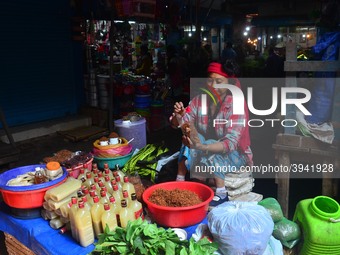 A Woman sells vegetables on the street on the eve of International Women’s Day in Dimapur,  India North eastern state of Nagaland on Thursda...